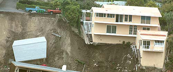 A house destroyed by a landslide.