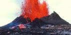 Volcano blowing white hot lava into the air