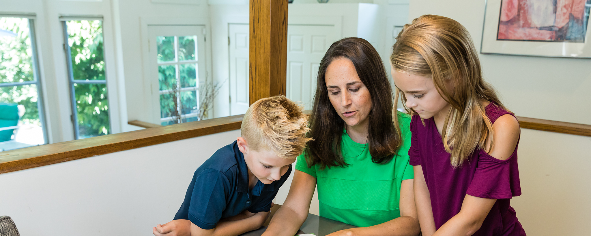 mother with two kids making a plan 