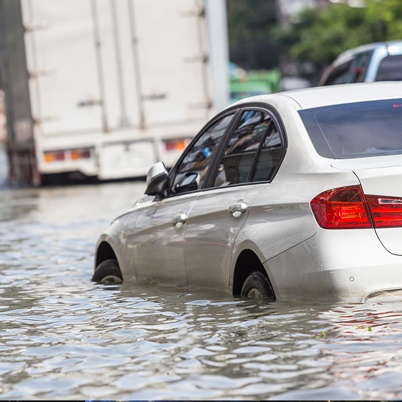 a car floating in flood waters