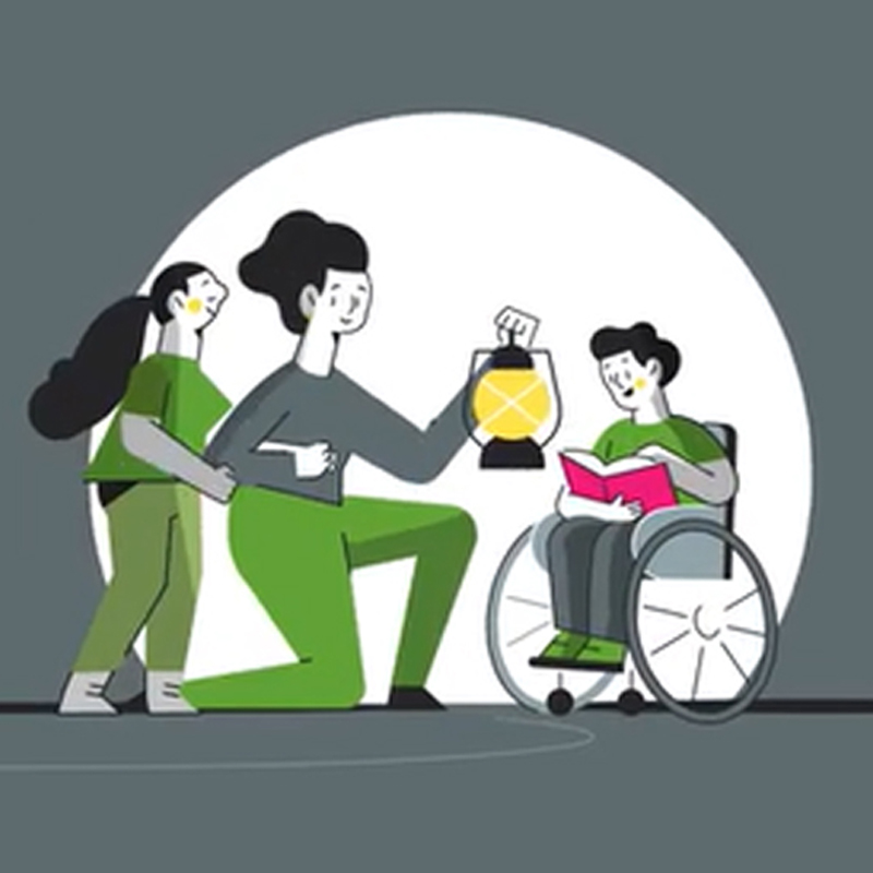 mother holding a lantern with two children, one in a wheelchair