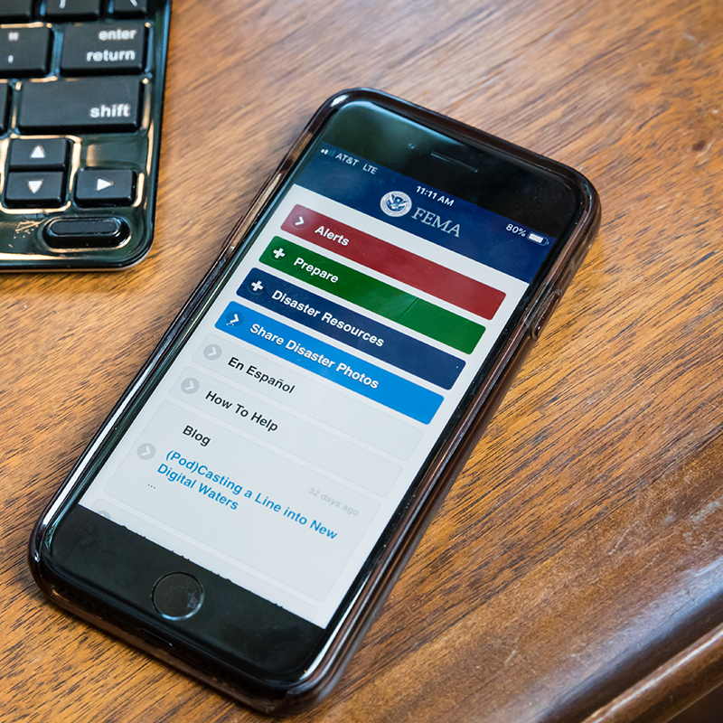 a smart phone open to the FEMA app