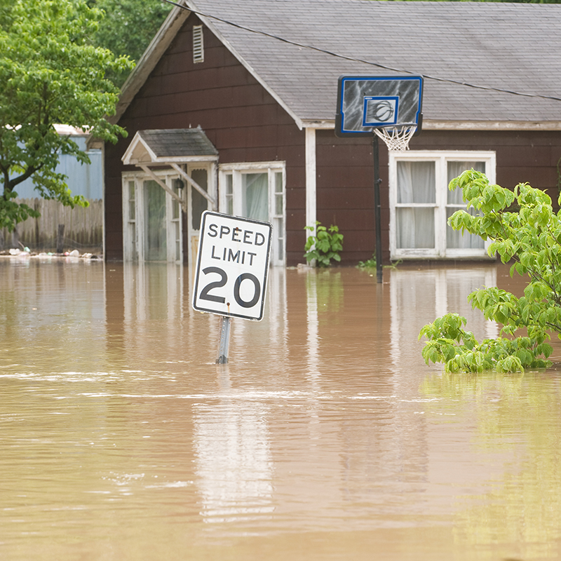 a car floating in flood waters