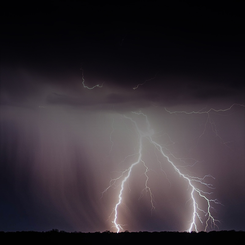 image of llightning striking the ground.