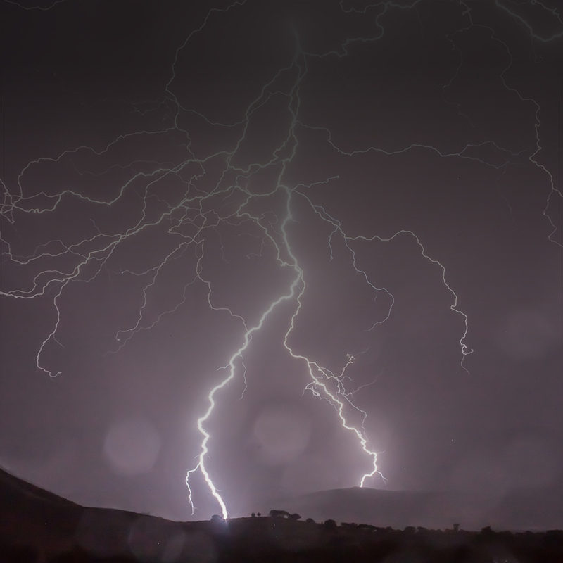 image of llightning striking the ground.