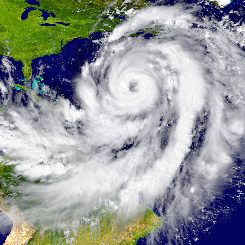 A satellite photograph of a hurricane over the Caribbean Ocean about to make landfall over Central America