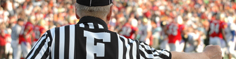 April 26th, 2011. A field judge at a football game calls a penalty.