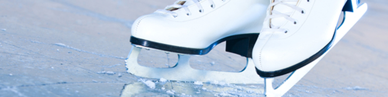 January 9th, 1994. Ice skates balance upon heavily skated iced.