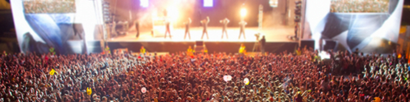 August 27th, 2011. A crowd of fans watching a concert on stage. August 27th, 2011. A crowd of fans watching a concert on stage.