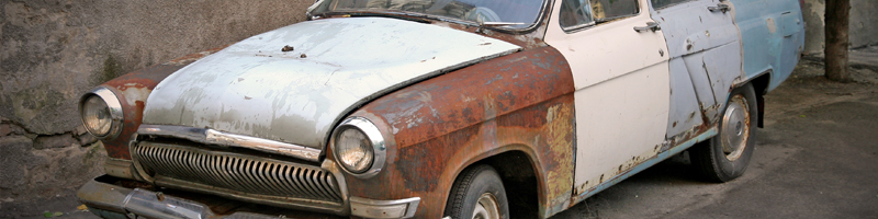 September 21st, 1989. A junk car sits in the driveway. September 21st, 1989. A junk car sits in the driveway.