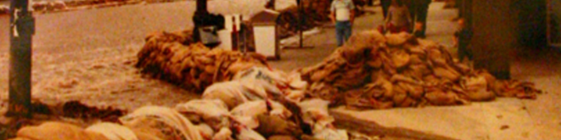 April 13th, 1983. Sandbags cover the street to help divert the floodwaters. Gerald Peterson, Utah Department of Transportation April 13th, 1983. Sandbags cover the street to help divert the floodwaters. Gerald Peterson, Utah Department of Transportation