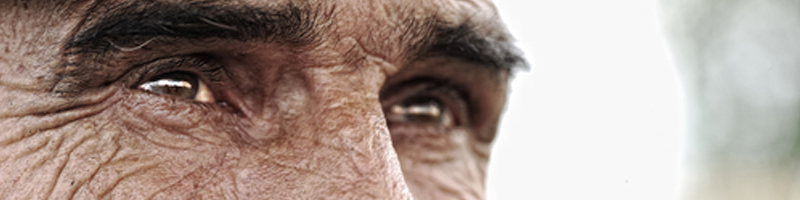 June 15th, 2003. A close-up photo of an elderly man looking into the distance. June 15th, 2003. A close-up photo of an elderly man looking into the distance.