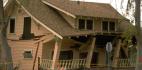 A house cracked and broken from earthquake damage