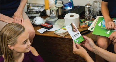 a family building an emergency supply kit