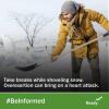 A man bundled up shoveling snow. Take breaks while shoveling snow. Overexertion can bring on a heart attack. #BeInformed