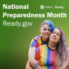 Two women wearing rainbow shirts hug. National Preparedness Month. 