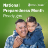 A son hugs his father from behind. National Preparedness Month.