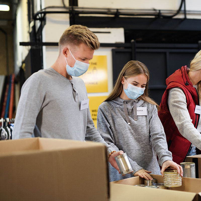 volunteers packing boxes